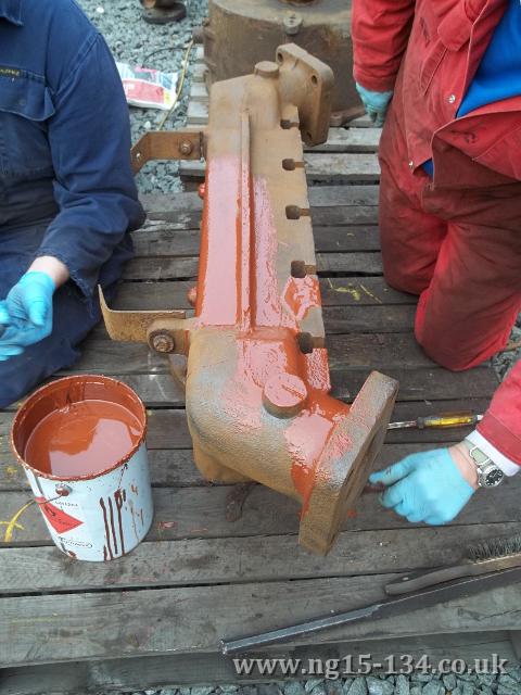 Cleaning and painting the superheater header. (Photo: L. Armstrong)